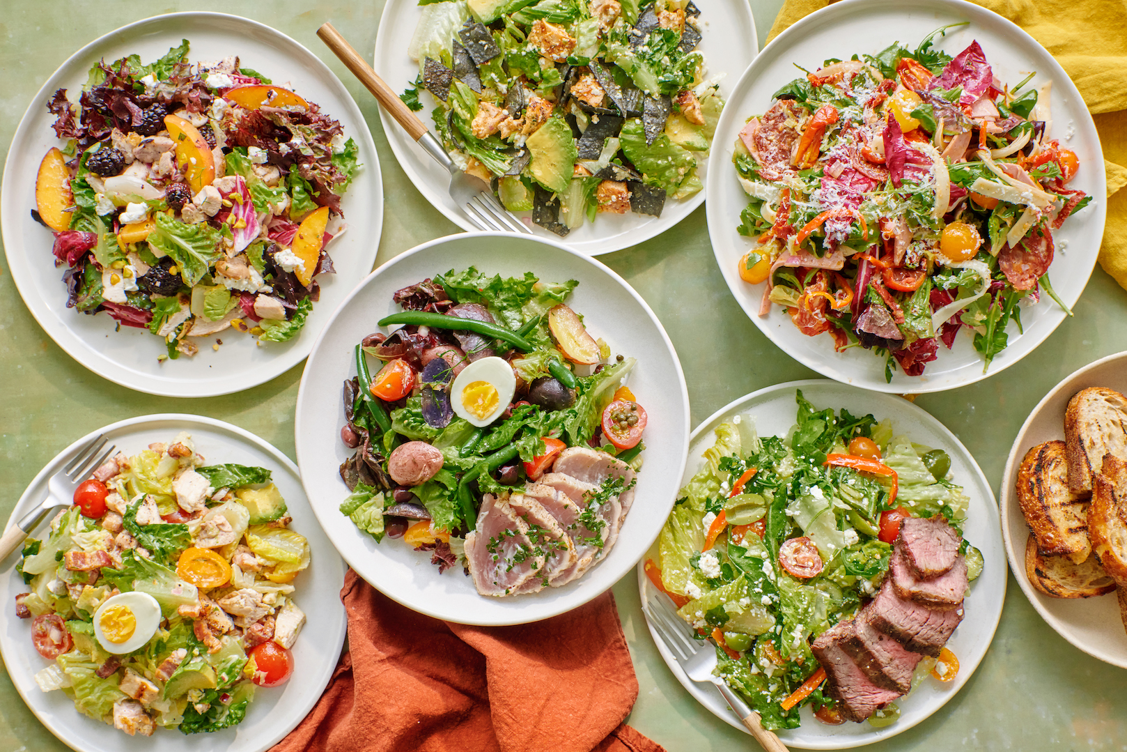 Tender Greens salad selections displayed on a table